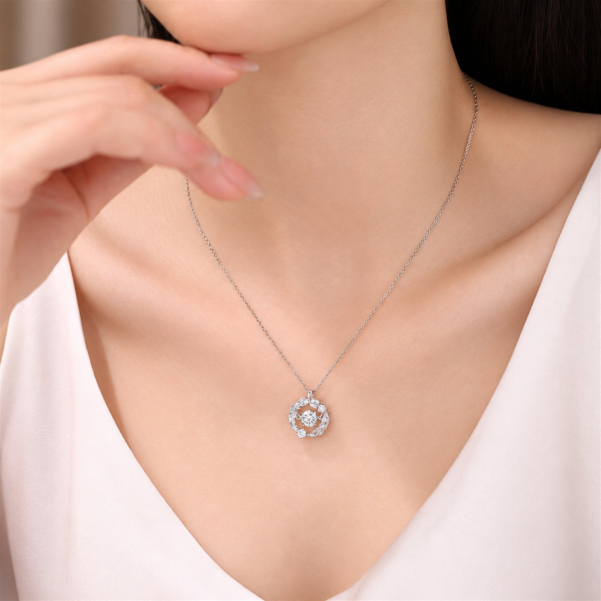 DANFÉE PT950 platinum wing-inspired diamond necklace — model wearing view