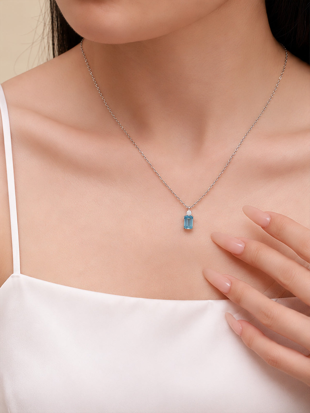 DANFÉE Parfum emerald-cut lab-grown blue diamond necklace on model