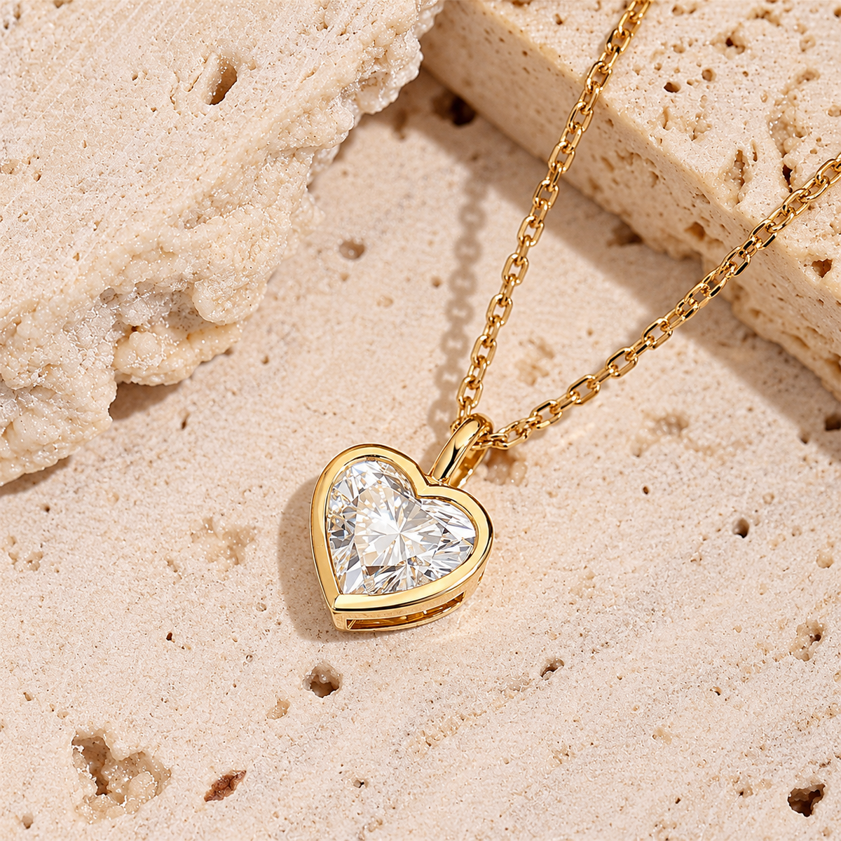 DANFÉE heart bezel diamond necklace on pale stone