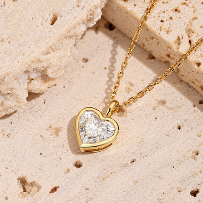 DANFÉE heart bezel diamond necklace on pale stone