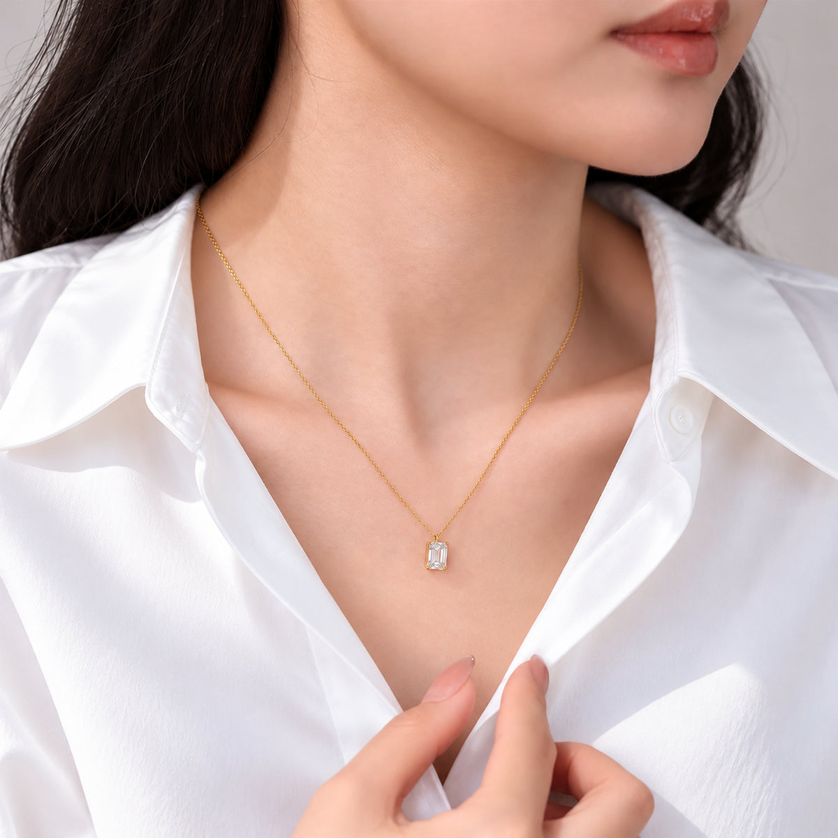 DANFÉE emerald-cut lab-grown diamond necklace worn with a white shirt