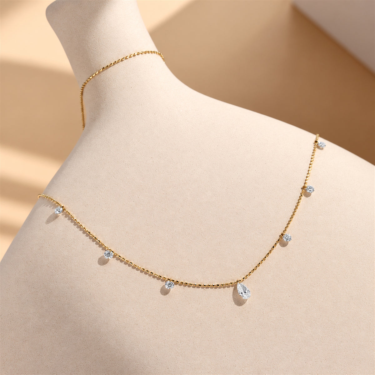 DANFÉE pear and round lab-grown diamond drop necklace yellow gold display detail