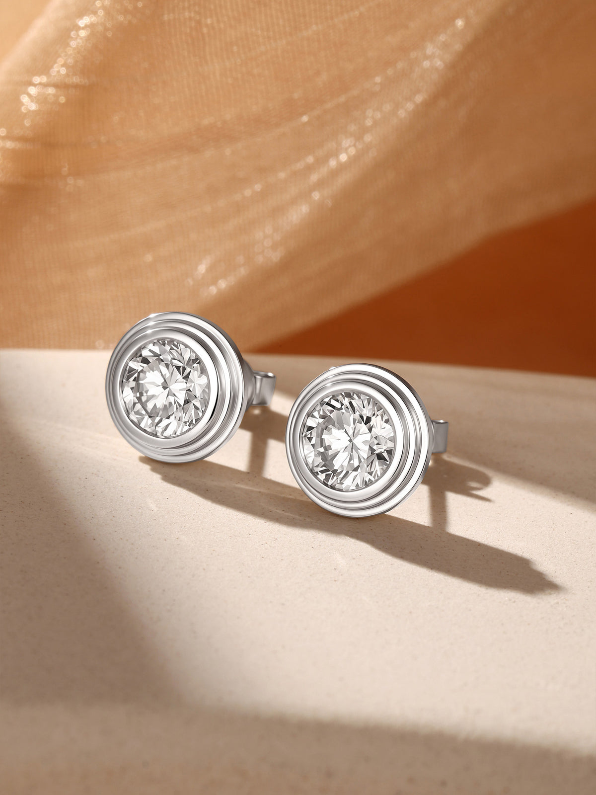 Orbite Tiered Bezel Round Lab-Grown Diamond Stud Earrings in 18K Gold | 1-2 Carat Total | D-E | VVS