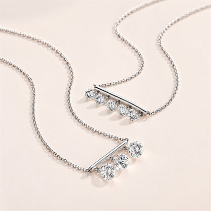 DANFÉE Design comparison of three-stone and five-stone diamond bar necklaces; this listing is the three-stone design