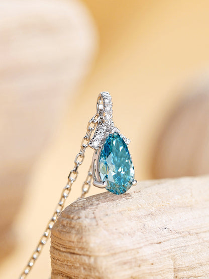 DANFÉE Ribbon Bow Pear 1 carat blue diamond pendant, side view of the pavé bow