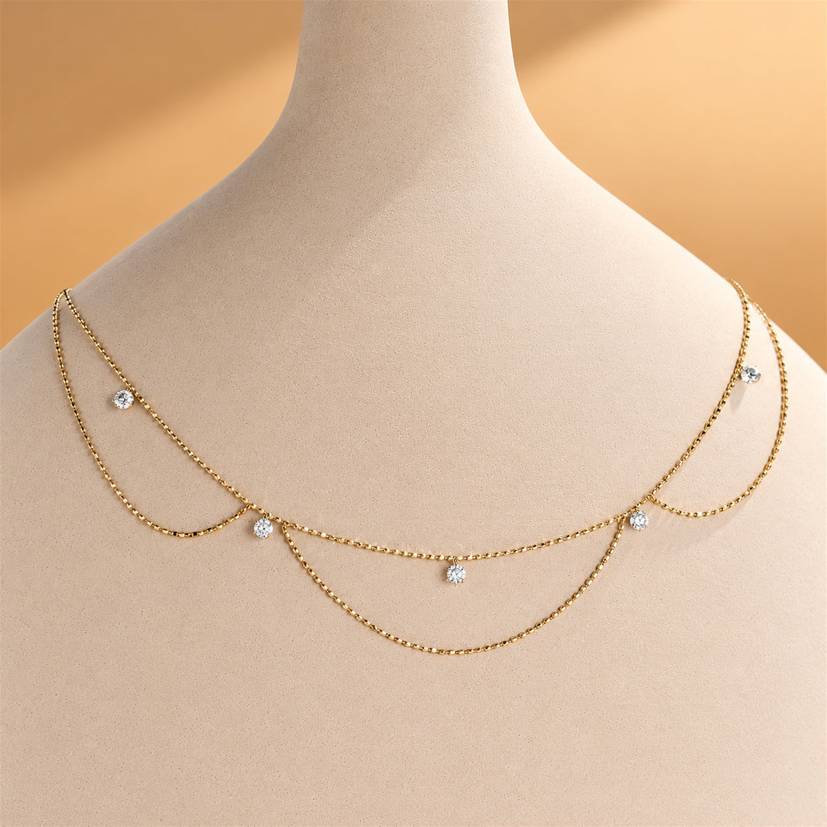 DANFÉE Goddess draped lab-grown diamond necklace, warm beige display scene — 4.jpg