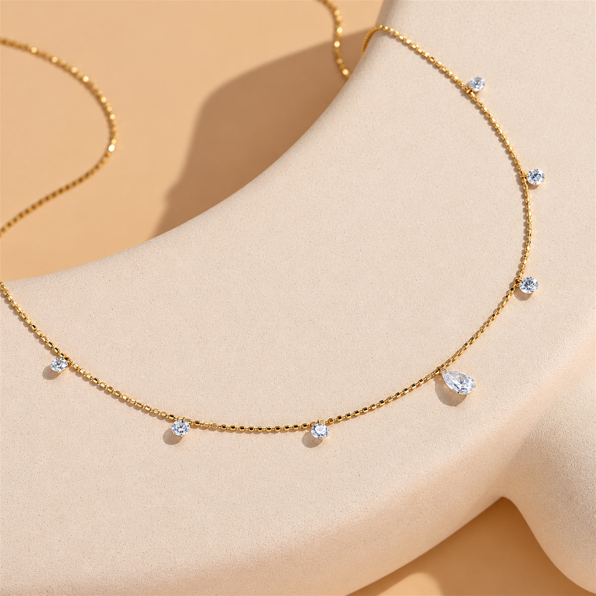 DANFÉE pear and round lab-grown diamond drop necklace yellow gold display detail