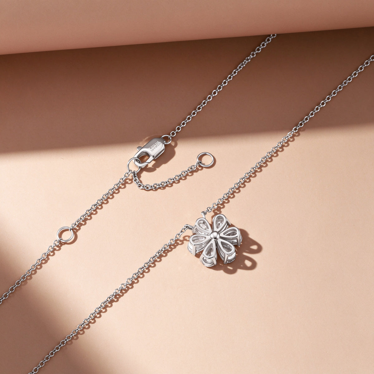 DANFÉE Forget-Me-Not necklace back view showing open claw setting and lobster clasp