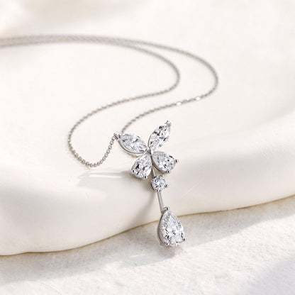DANFÉE butterfly pear drop lab-grown diamond necklace, styled on ivory
