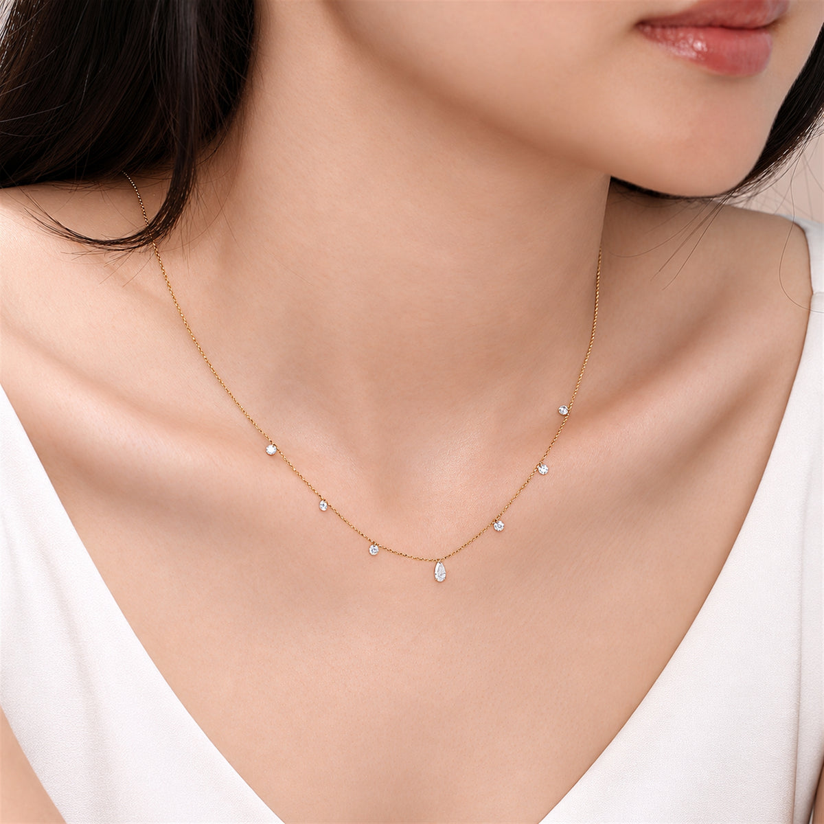 DANFÉE pear and round lab-grown diamond drop necklace yellow gold worn on model