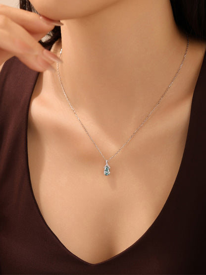 DANFÉE Ribbon Bow Pear blue diamond necklace worn at the collarbone