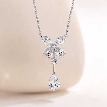 DANFÉE butterfly pear drop lab-grown diamond necklace, styled on warm neutral