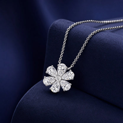 DANFÉE Forget-Me-Not lab-grown diamond necklace on a navy velvet display