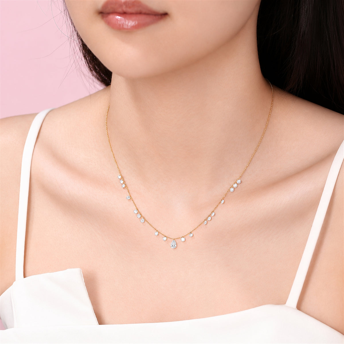 DANFÉE Muse lab-grown diamond station necklace — angled model wearing view against pink background