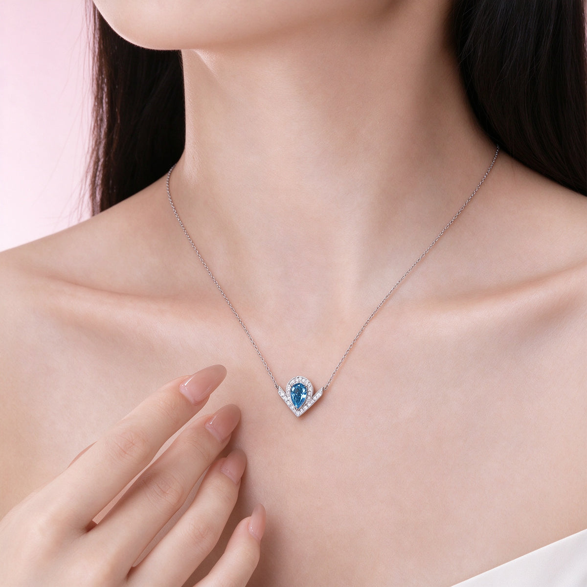 DANFÉE Chevron Pear Halo lab-grown blue diamond necklace on model