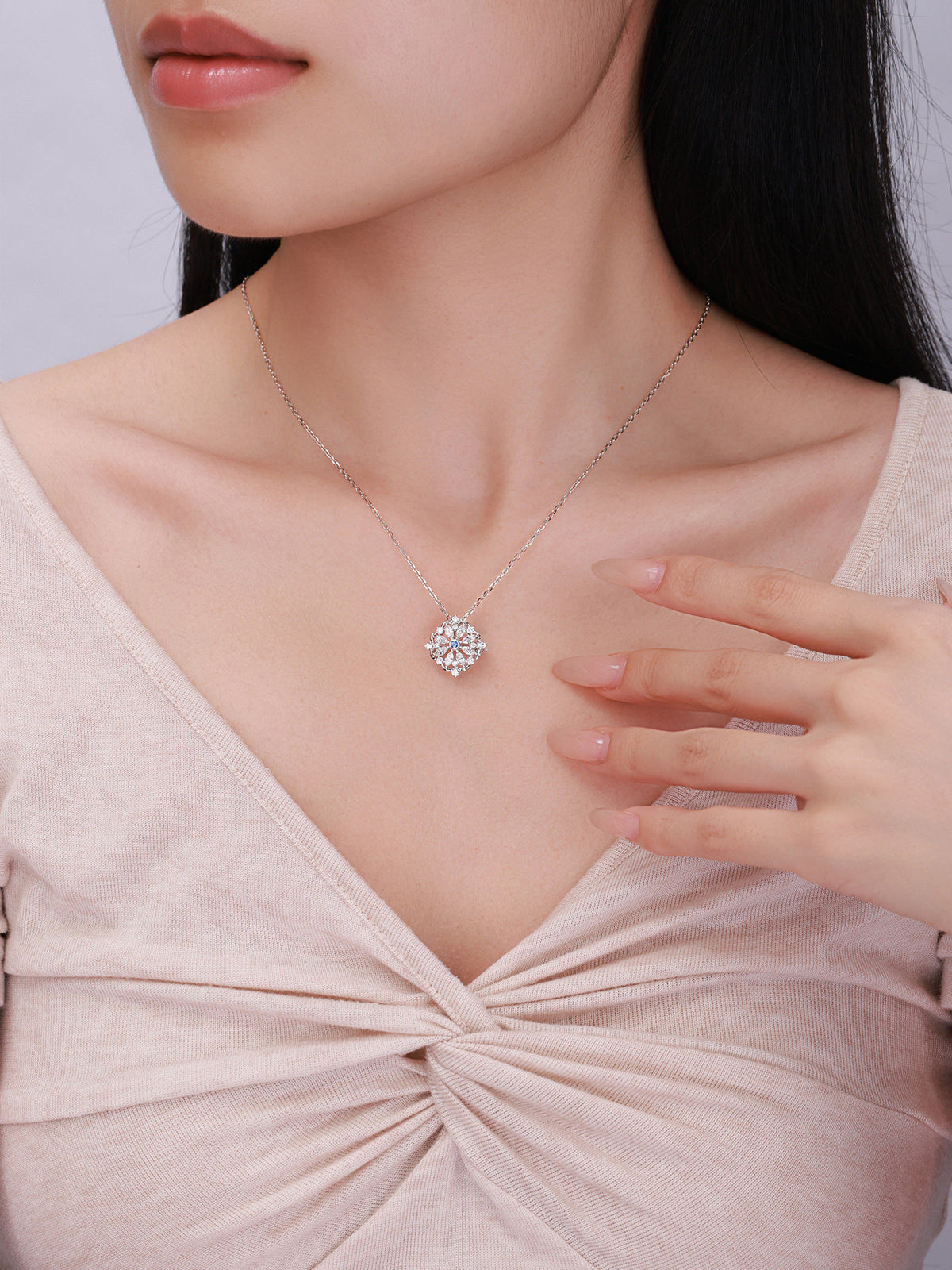 Model wearing DANFÉE Iris lab-grown diamond pendant necklace