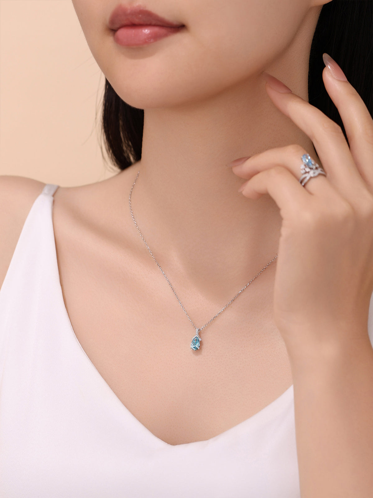DANFÉE Ribbon Bow Pear lab-grown blue diamond necklace on model