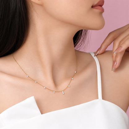 DANFÉE pear and round lab-grown diamond drop necklace yellow gold worn on model
