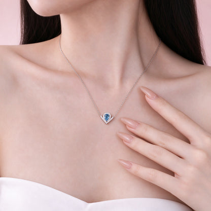 DANFÉE Chevron Pear Halo 1 carat blue diamond necklace on model
