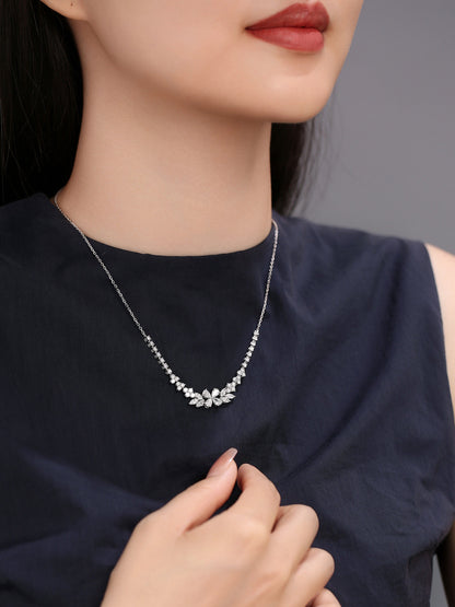 Model wearing DANFÉE Blossom Cluster lab-grown diamond necklace at the collarbone