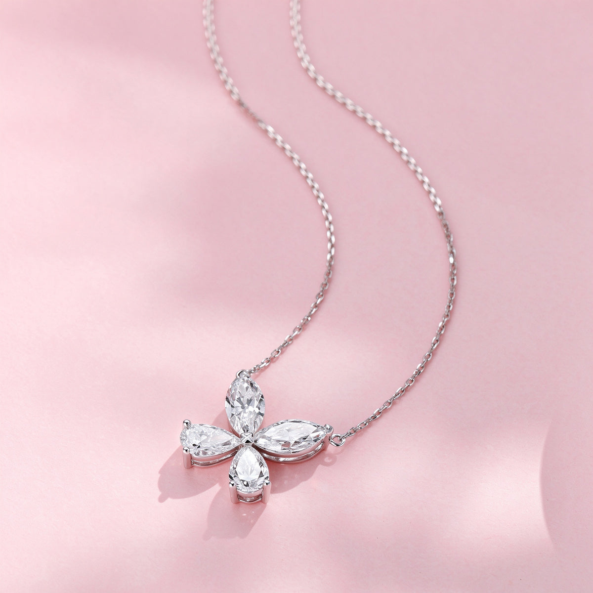 DANFÉE Four-Leaf Clover lab-grown diamond necklace, pink background scene