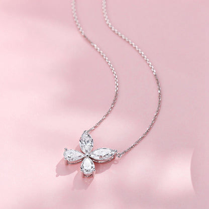 DANFÉE Four-Leaf Clover lab-grown diamond necklace, pink background scene
