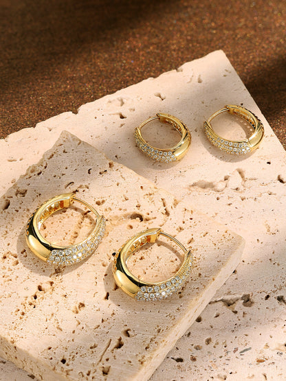 Small 8mm and large 12mm pavé diamond huggie earrings in 18K gold