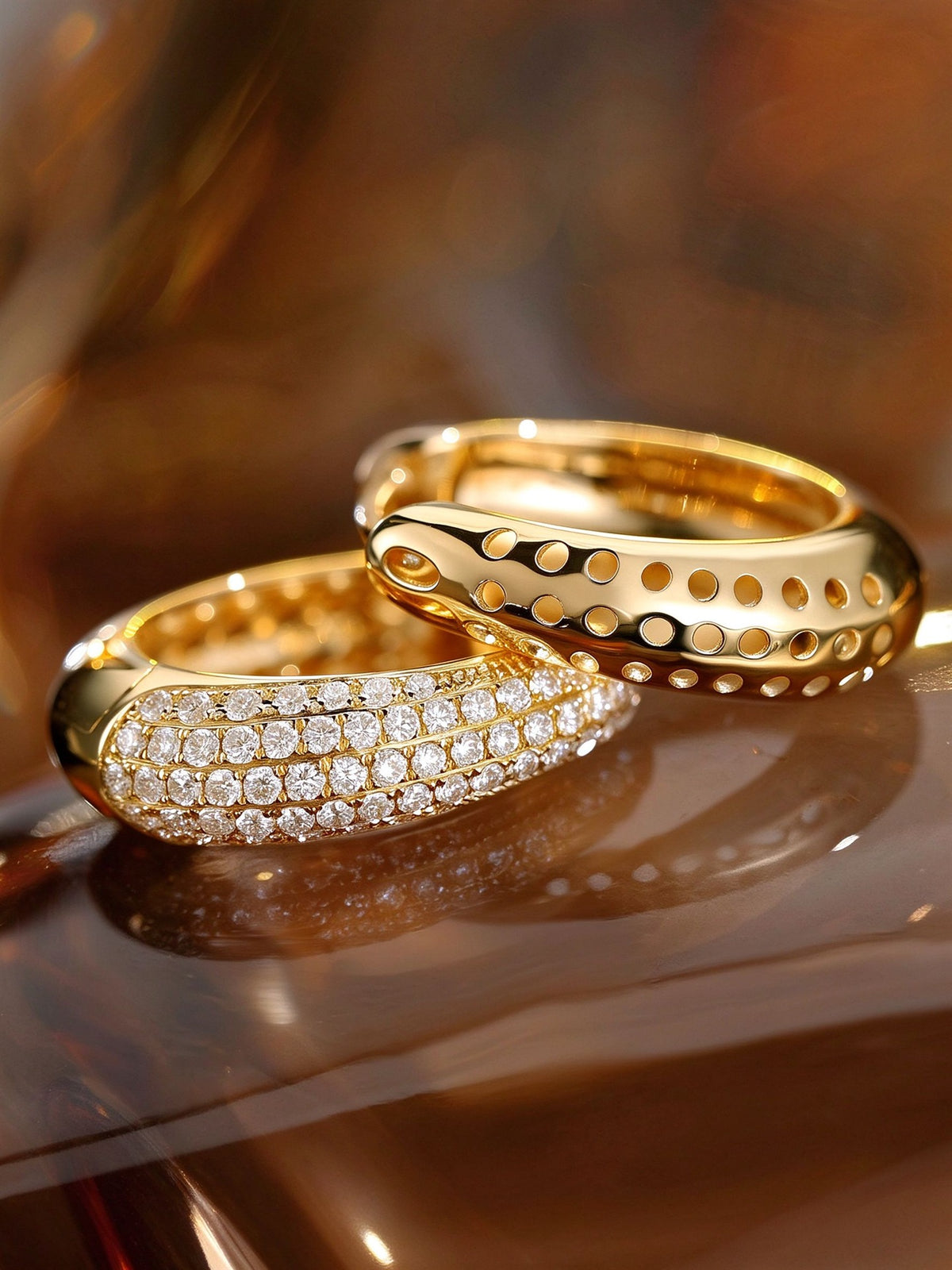 Pavé front and pierced gallery of 18K gold diamond huggie earrings
