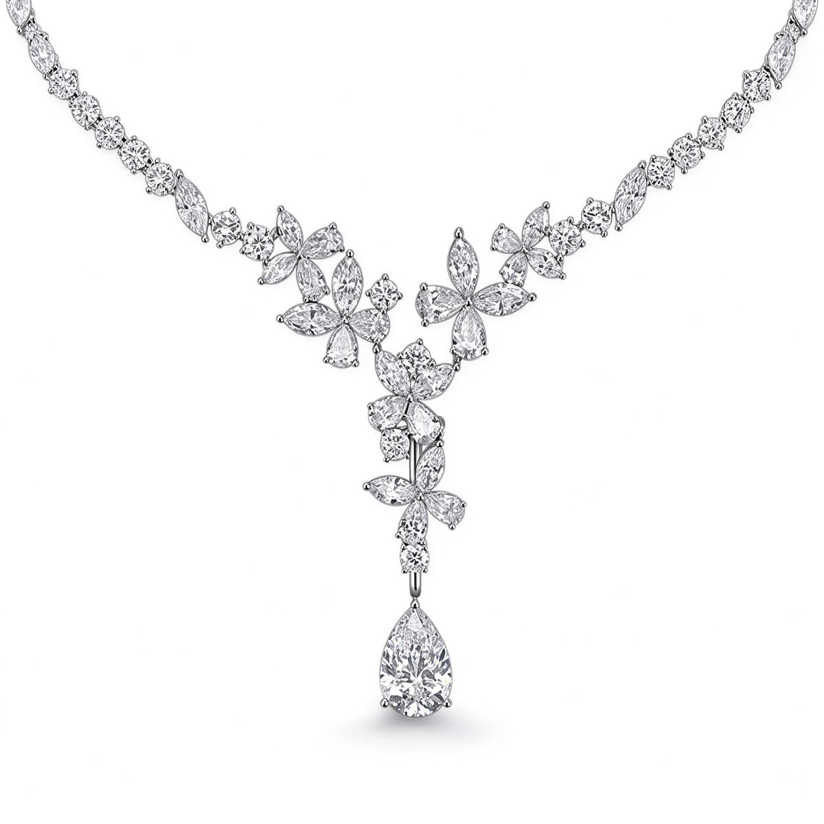 Close-up of floral marquise and pear diamond cluster with 5 carat pear drop in PT950 platinum