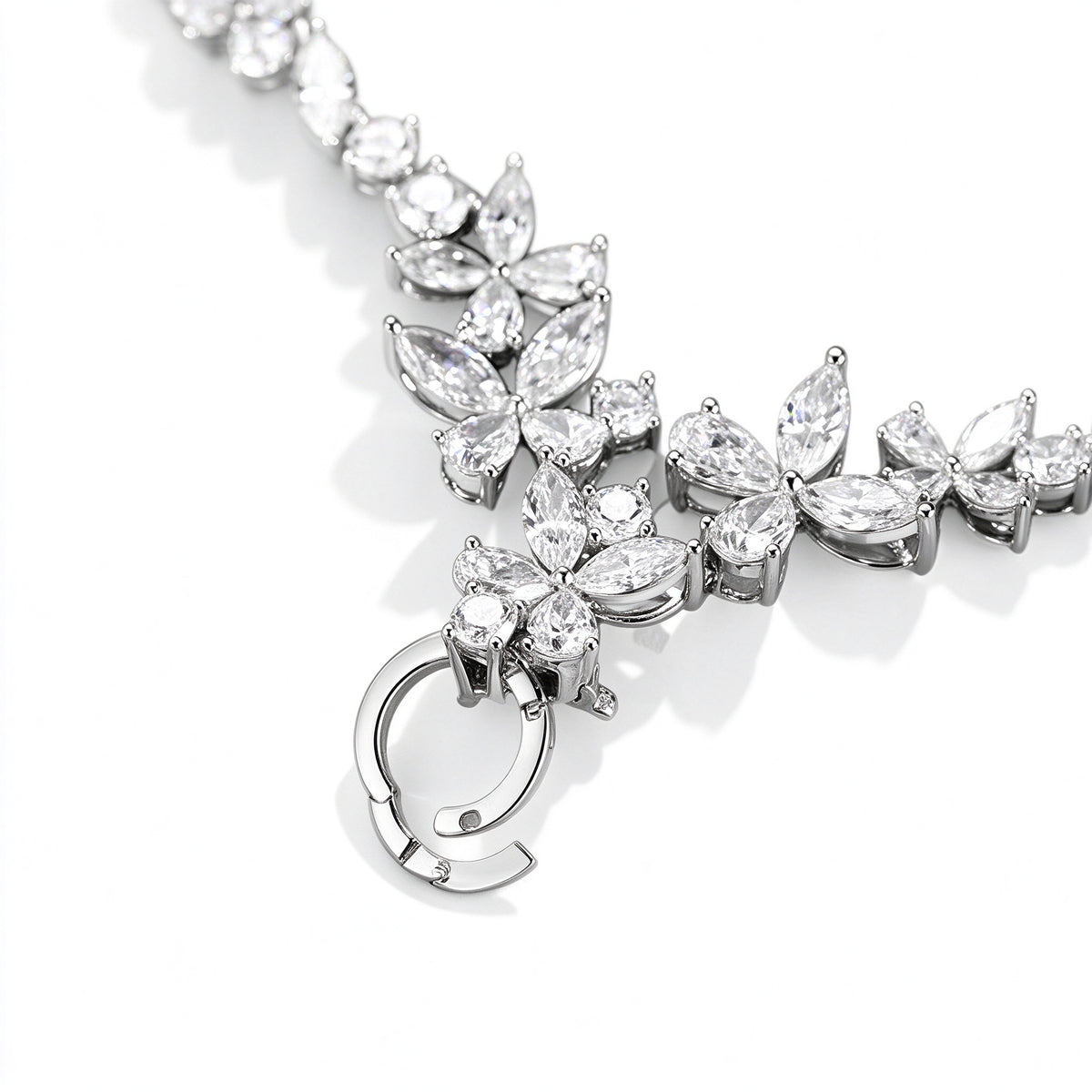 Detail of diamond blossoms and hinged ring clasp on PT950 platinum necklace