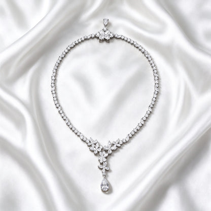 Blossom Cascade lab-grown diamond necklace laid on white silk