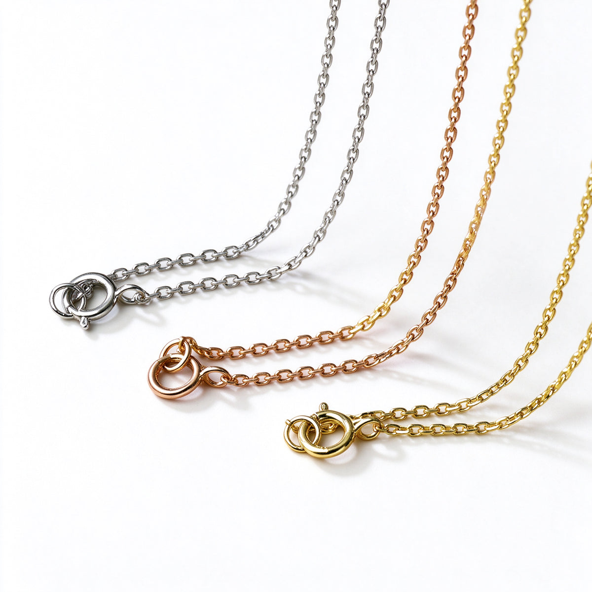 18K white, rose and yellow gold cable chains for the DANFÉE Celeste Cross necklace