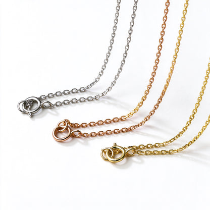 18K white, rose and yellow gold cable chains for the DANFÉE Celeste Cross necklace