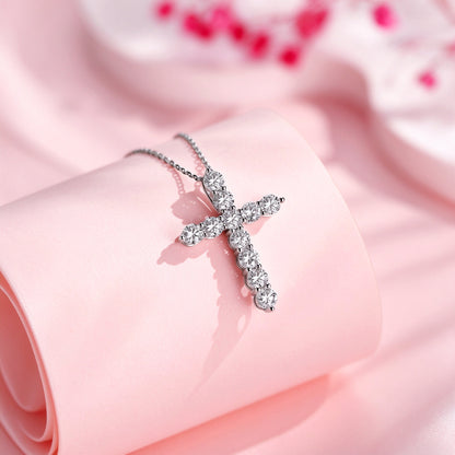 Close-up of eleven round lab-grown diamonds in a platinum cross
