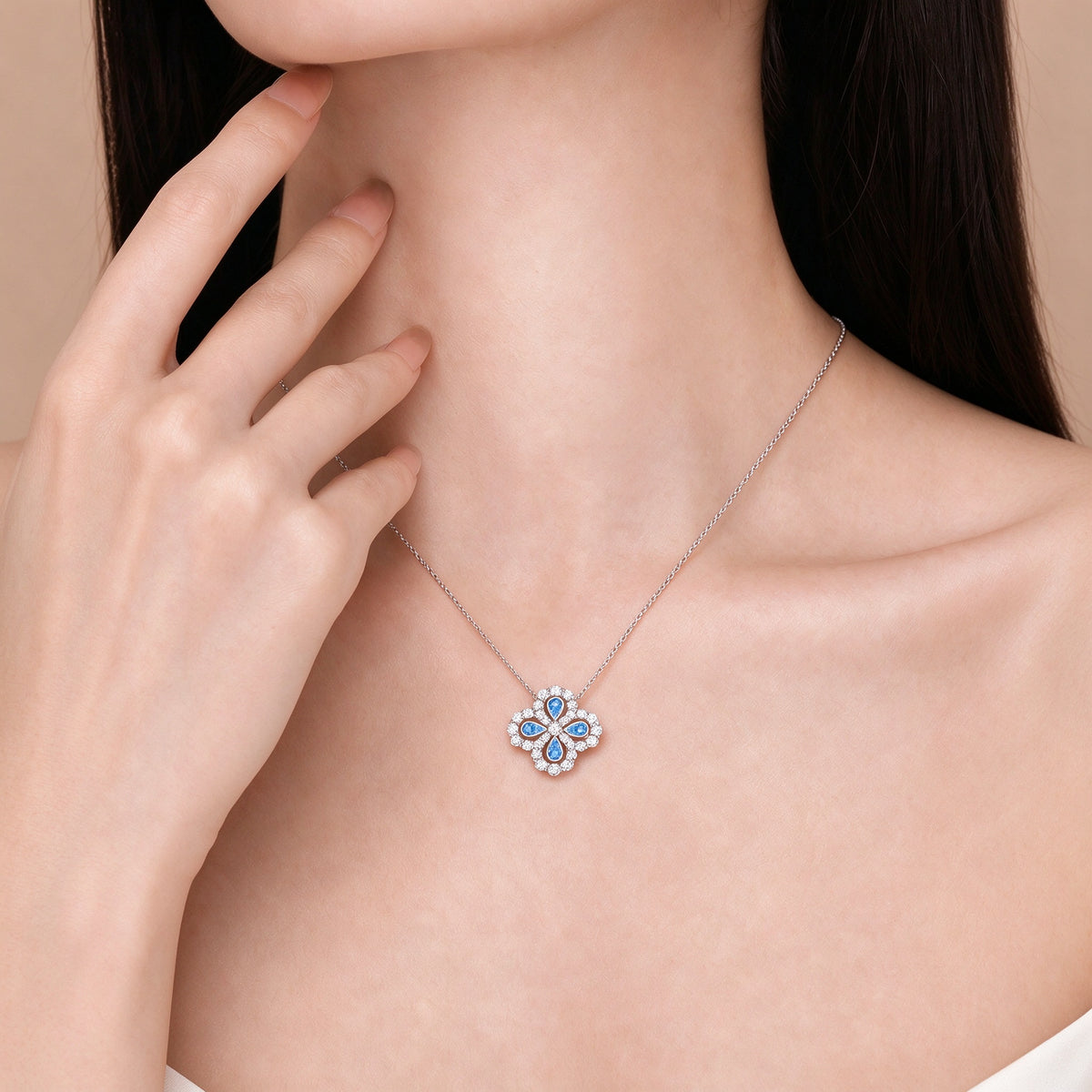 Clover Loop lab-grown diamond necklace worn at the collarbone
