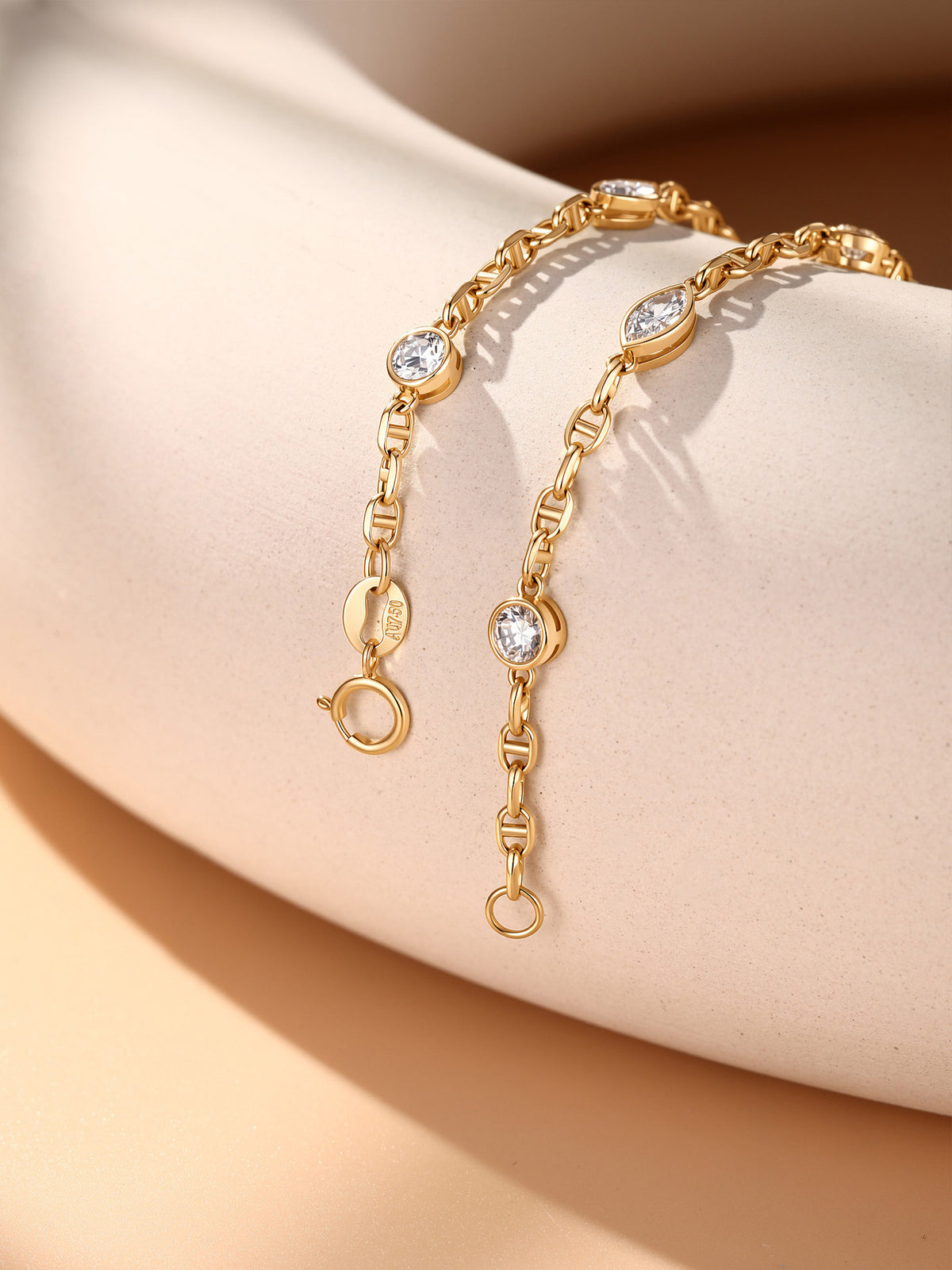 18K gold spring ring clasp with Au750 hallmark tag
