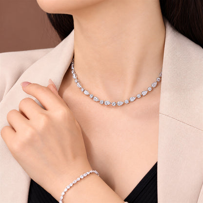 DANFÉE 21 carat pear and round lab-grown Model wearing pear and round diamond necklace