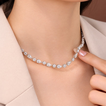 DANFÉE 21 carat pear and round lab-grown Model wearing pear and round diamond necklace