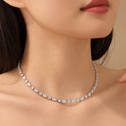 DANFÉE 21 carat pear and round lab-grown Model wearing pear and round diamond necklace
