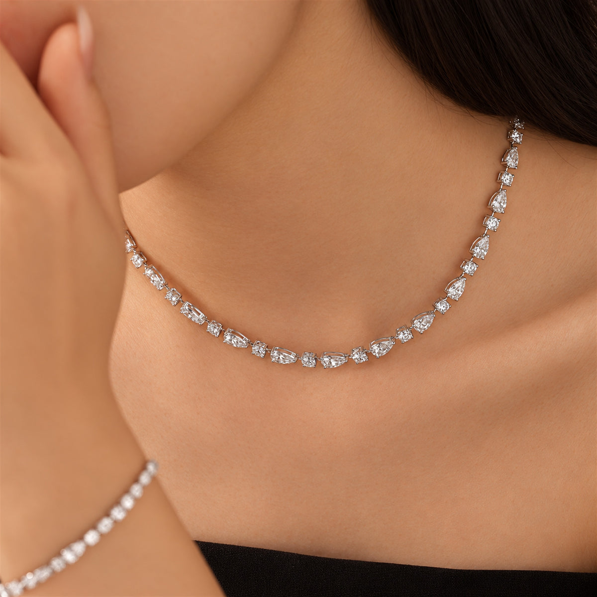 DANFÉE 21 carat pear and round lab-grown Model wearing pear and round diamond necklace