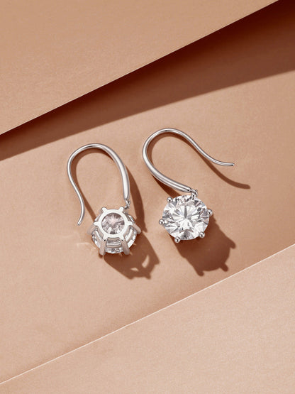 Aurore round diamond drop earrings showing six-prong basket and French hook
