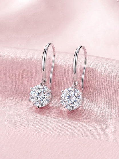 Aurore lab-grown diamond hook drop earrings in 18K white gold on pink satin