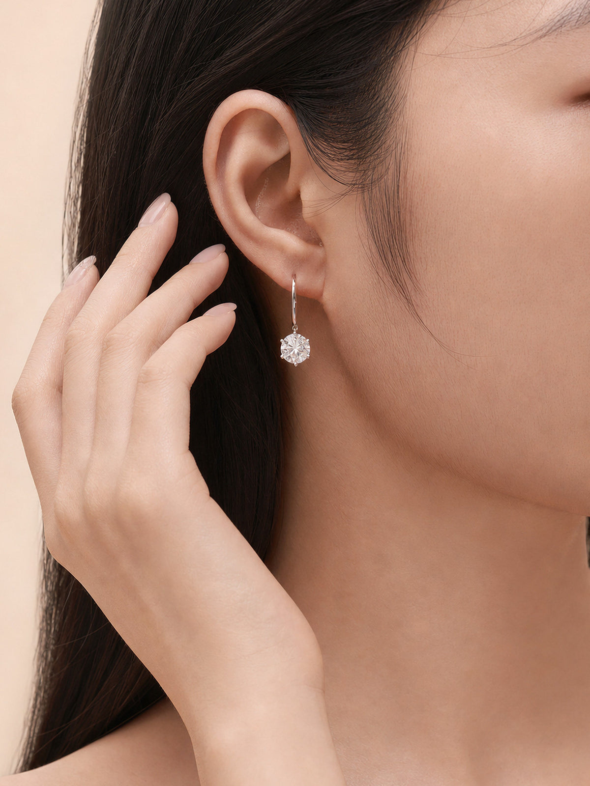 Model wearing Aurore round lab-grown diamond drop earring