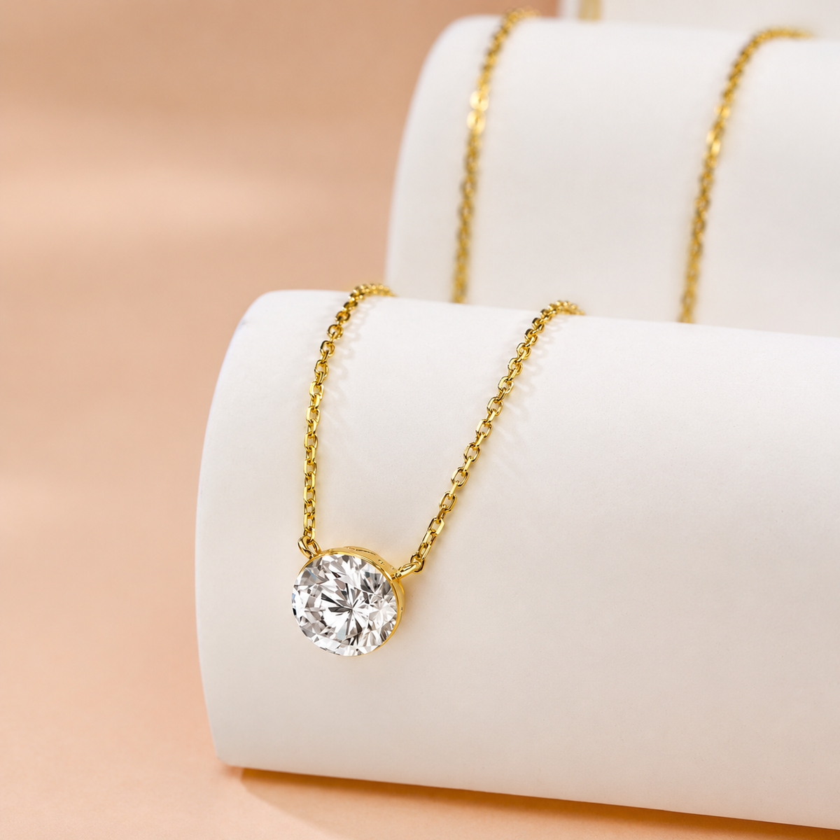 DANFÉE yellow gold bezel diamond necklace on a white display