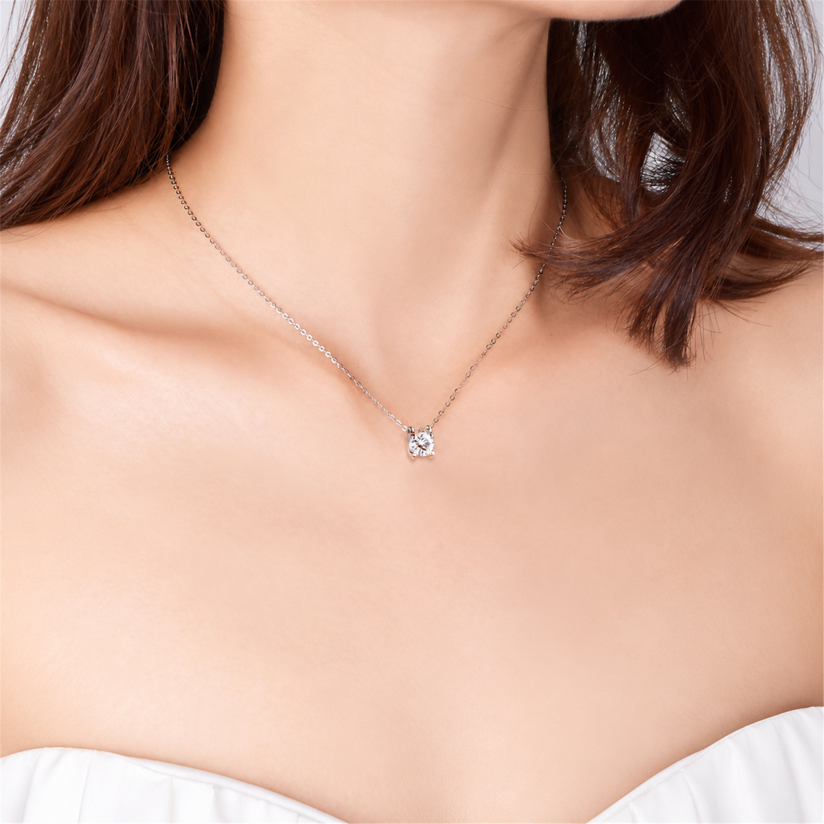 Bull-head diamond pendant necklace worn in white gold, model view