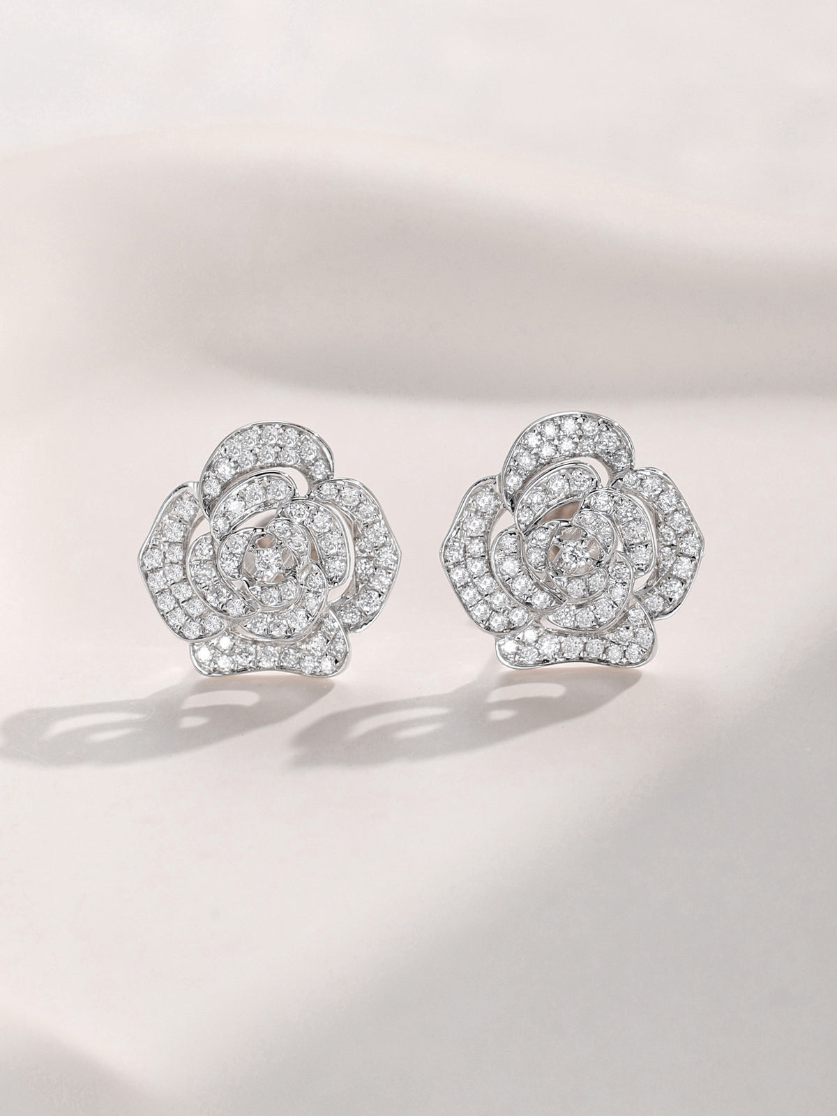 Pair of pavé diamond camellia stud earrings