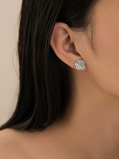 Camellia lab-grown diamond stud earring worn on the ear