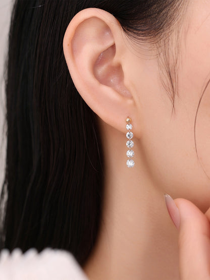 Lab-grown diamond linear drop earring worn by model