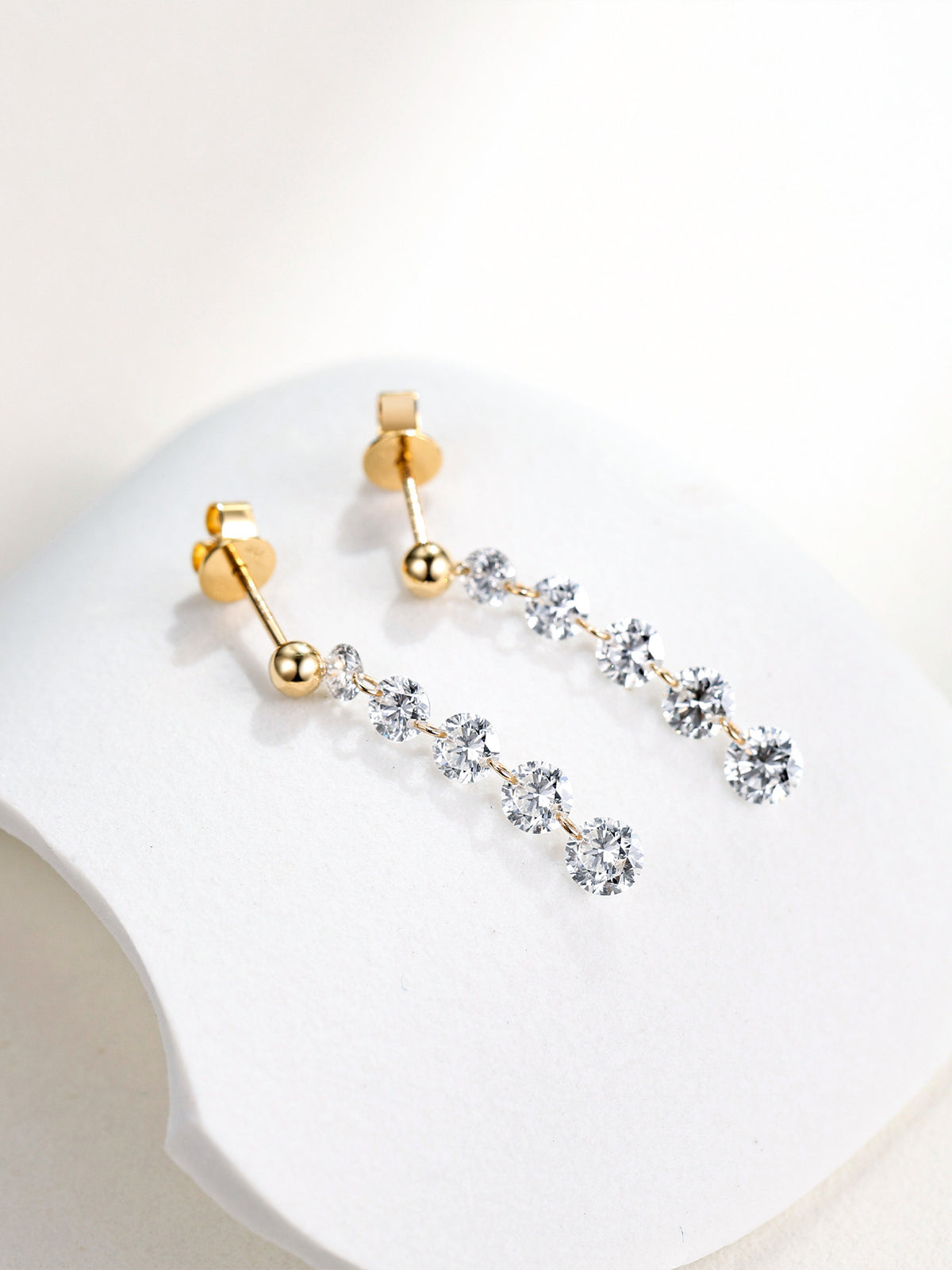 Five-stone lab-grown diamond drop earrings with gold bead stud