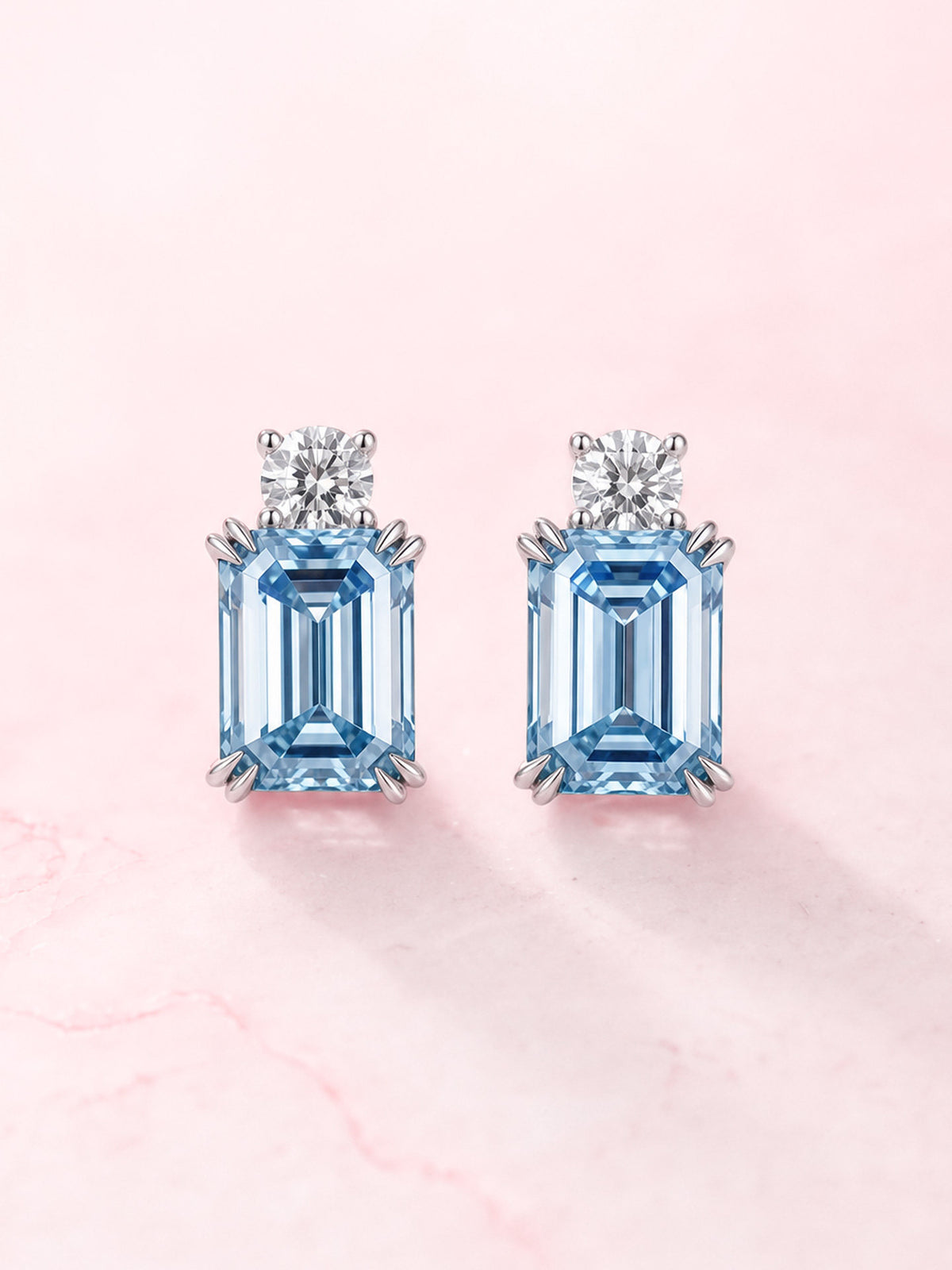 2 carat blue emerald-cut lab-grown diamond stud earrings front view
